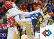 A final match is underway between Iran's Farzan Ashour Zadeh Fallah and Belgium's Si Mohammed Ketbi in the men's -58kg category on the second day of the 2015 WTF World Taekwondo Championships at the Traktor Arena in Chelyabinsk, Russia on May 13, 2015. Russia's Ruslan Poiseev and China's Shui Zhao earned their respective country the bronze medal in the same division.